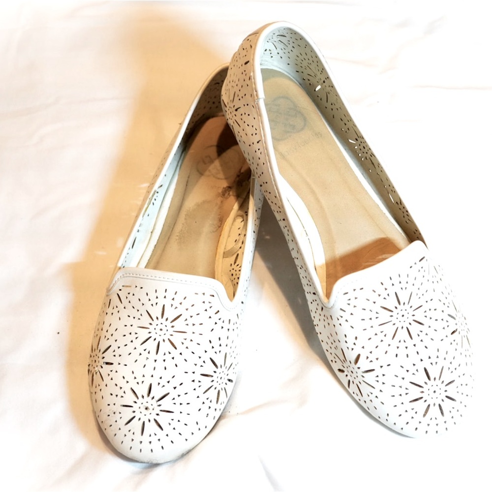 White coral leather flats.
